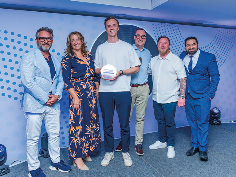 : Bakers team receiving the Best Company to Work For award at the Digital Labels and Packaging Awards 2026